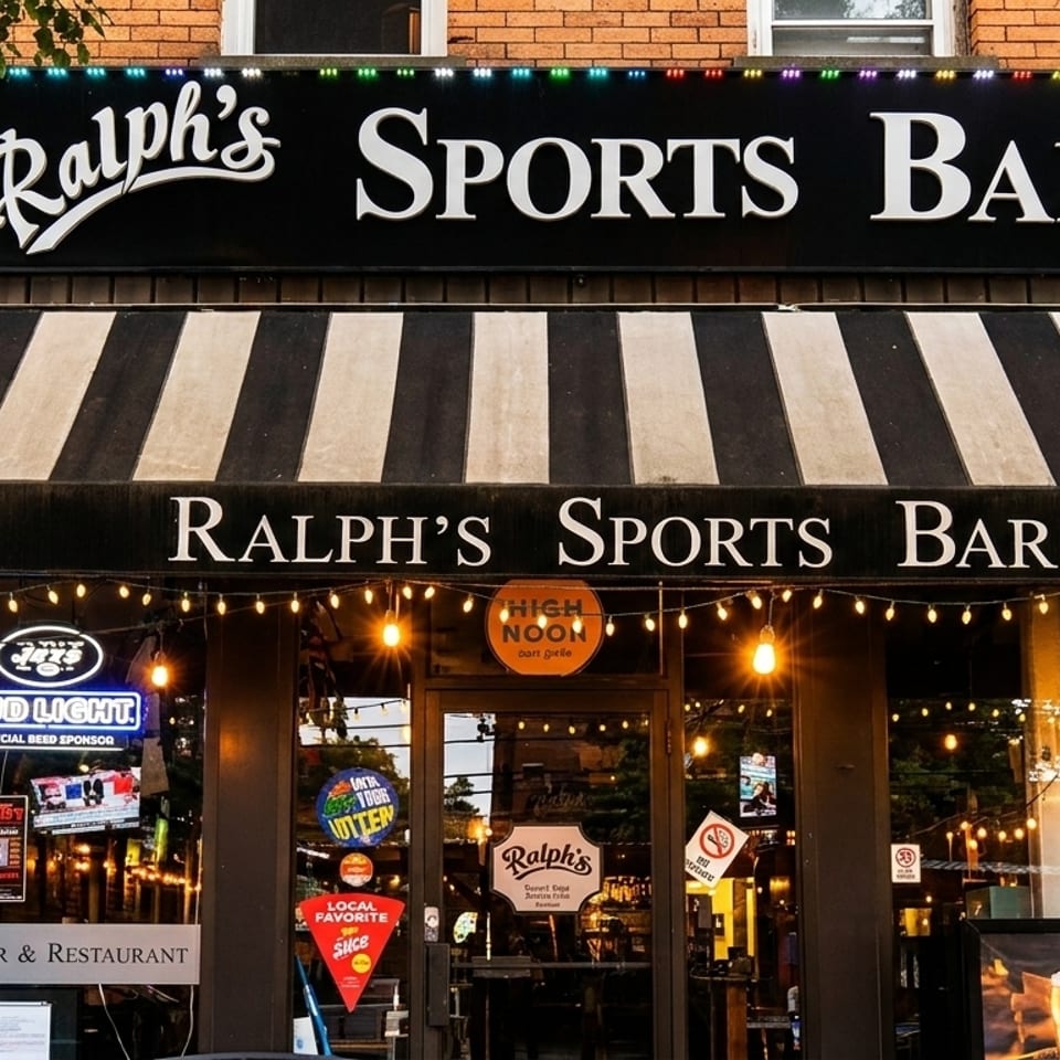Ralph's Sports Bar storefront with a black and white striped awning and string lights.